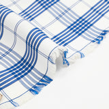 Twill de viscose à carreaux bleus fond blanc cassé