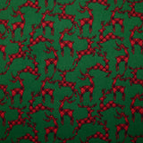 Flanelle de coton imprimée cerfs tartan rouge fond vert gazon