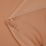 Satin de polyester léger beige rosé