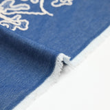 Chambray de coton brodé fond denim