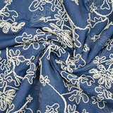 Chambray de coton brodé fond denim