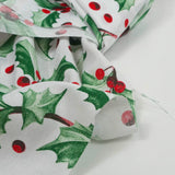 Polycoton imprimé Noël houx vert et boule rouge