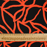 Ottoman viscose crêpe spaghetti orange print black background