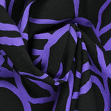 Otomano viscosa panqueque estampado espagueti de fondo negro púrpura