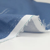 Coton imprimé palmier fond bleu lavande