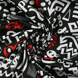 Satin de coton léger imprimé graffitis blanc et rouge fond noir