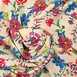 Viscose imprimée liane de fleurs bleu fond sable