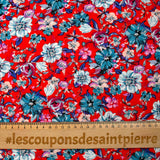 Viscose imprimée fleurs turquoise fond rouge