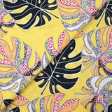 Linen Print Viscose Rain of Monsteras Yellow Nankin background