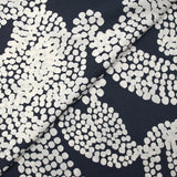 Fine viscose satin with cashmere polka dot print, navy background
