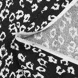Lin viscose imprimé léopard féroce fond noir