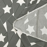 Fine viscose satin with black and off-white intertwined star print