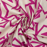 Star printed cotton poplin in magenta off-white background