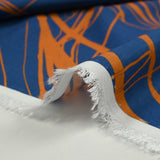 Printed viscose iconic flowers royal blue background