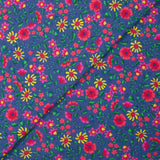 Velours de coton côtelé imprimé vent de fleurs fond bleu barbeau