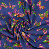 Velours de coton côtelé imprimé papillons fond indigo