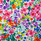 Crépon viscose lurex imprimé fleurs rose, vert et jaune fond blanc