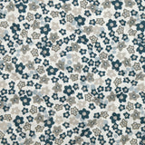 Coton matelassé double face Mayla fleurs bleu fond blanc au mètre