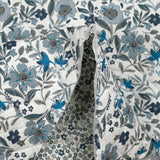 Coton matelassé double face Mayla fleurs bleu fond blanc au mètre