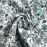Coton matelassé double face Mayla fleurs bleu fond blanc au mètre