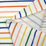 Coton imprimé rayures colorées fond blanc cassé