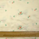 Polyester satin embroidered peach flowers ivory background