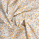 Coton imprimé fleurs de Jade moutarde fond écru