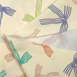 Lazos de cinta estampada de algodón con fondo crudo