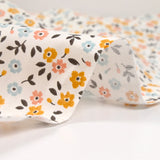 Coton imprimé fleurs de Jade moutarde fond écru