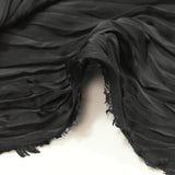 Black crinkle-effect pleated polyester satin