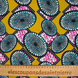 Coton imprimé ethnique Almere bleu et fuchsia fond ocre