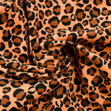 Velours de coton côtelé imprimé léopard fond camel