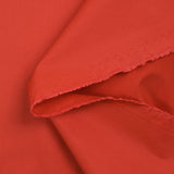 Popeline de coton technique rouge vermillon
