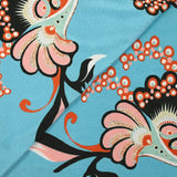 Jersey imprimé envolée fond bleu turquoise