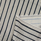 Lino viscosa estampado con doble raya azul marino sobre fondo crudo