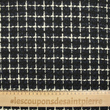 Wool blend tweed with ecru checks on navy and black background