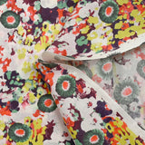 Coton fin imprimé primevère fond rose pâle