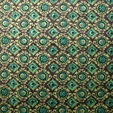 Velours matelassé double face block print et abstrait turquoise au mètre