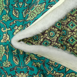 Velours matelassé double face block print et abstrait turquoise au mètre