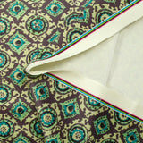 Velours ras imprimé abstrait gris et turquoise fond vert clair