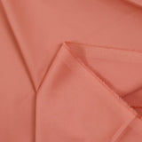 Satin de coton élasthanne fantaisie rose saumon