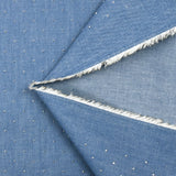 Chambray de algodón decorado con pedrería fondo azul denim