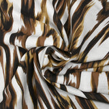 Crêpe viscose imprimé ondes abstraites marron fond blanc