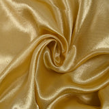 Crêpe satin polyester doré foncé