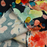 Viscose linen printed with multicolored balloons on navy background