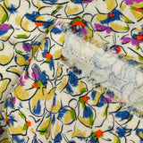 Lin viscose imprimé fleurs de pensées violet et vert fond écru