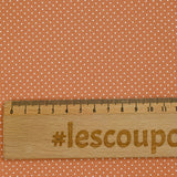 Coton imprimé pois 1mm fond terre de sienne