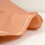 Coton imprimé pois 1mm fond terre de sienne