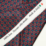 Silk satin printed naples red diamonds background marine