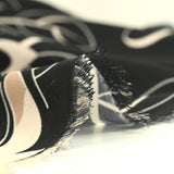 Crêpe imprimé mirage de fleurs fond noir